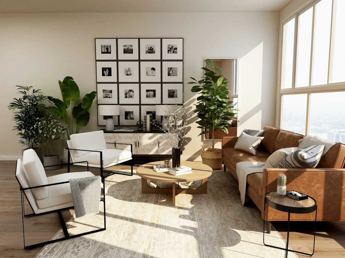 Bright, airy living room with soft neutral furnishings and greenery