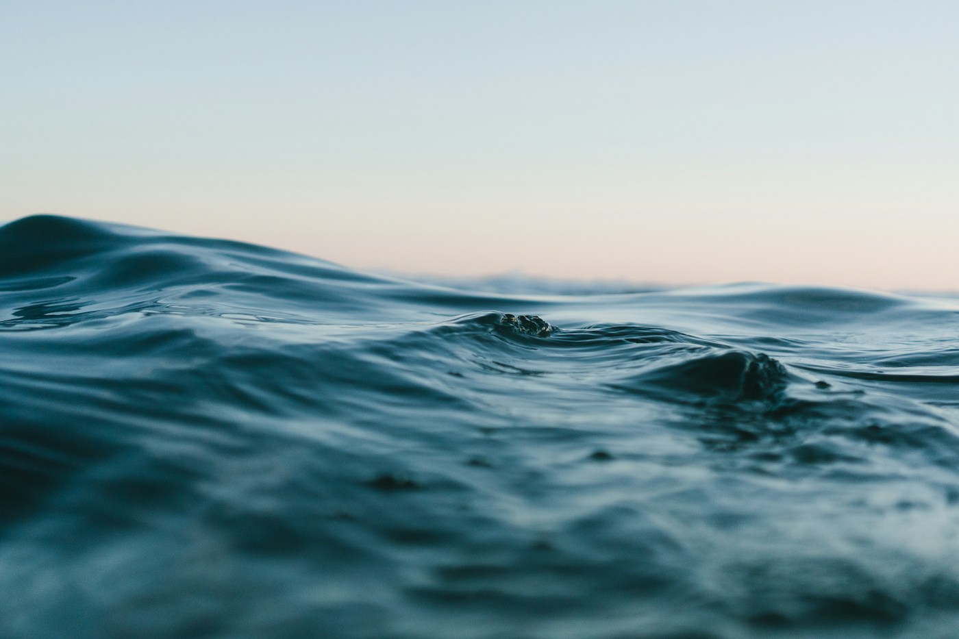 Blue ocean waves rolling toward the shore